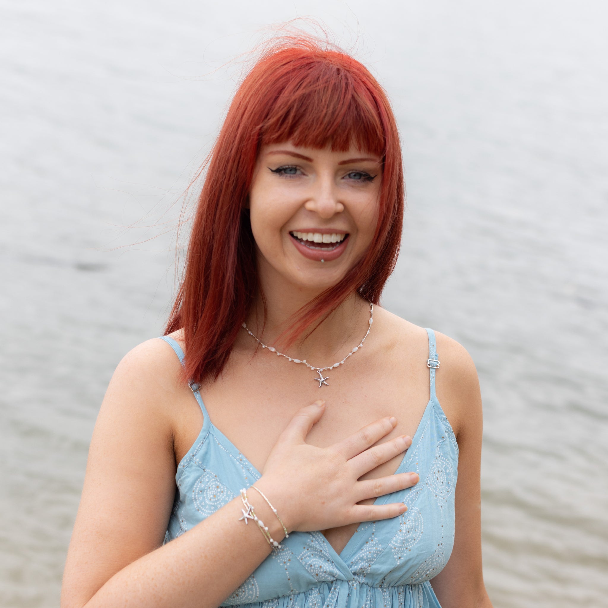 Intuitive Charms Nerina's Song Peridot natural Crystal beaded custom Bracelet in silver on model half body shot and also moonstone