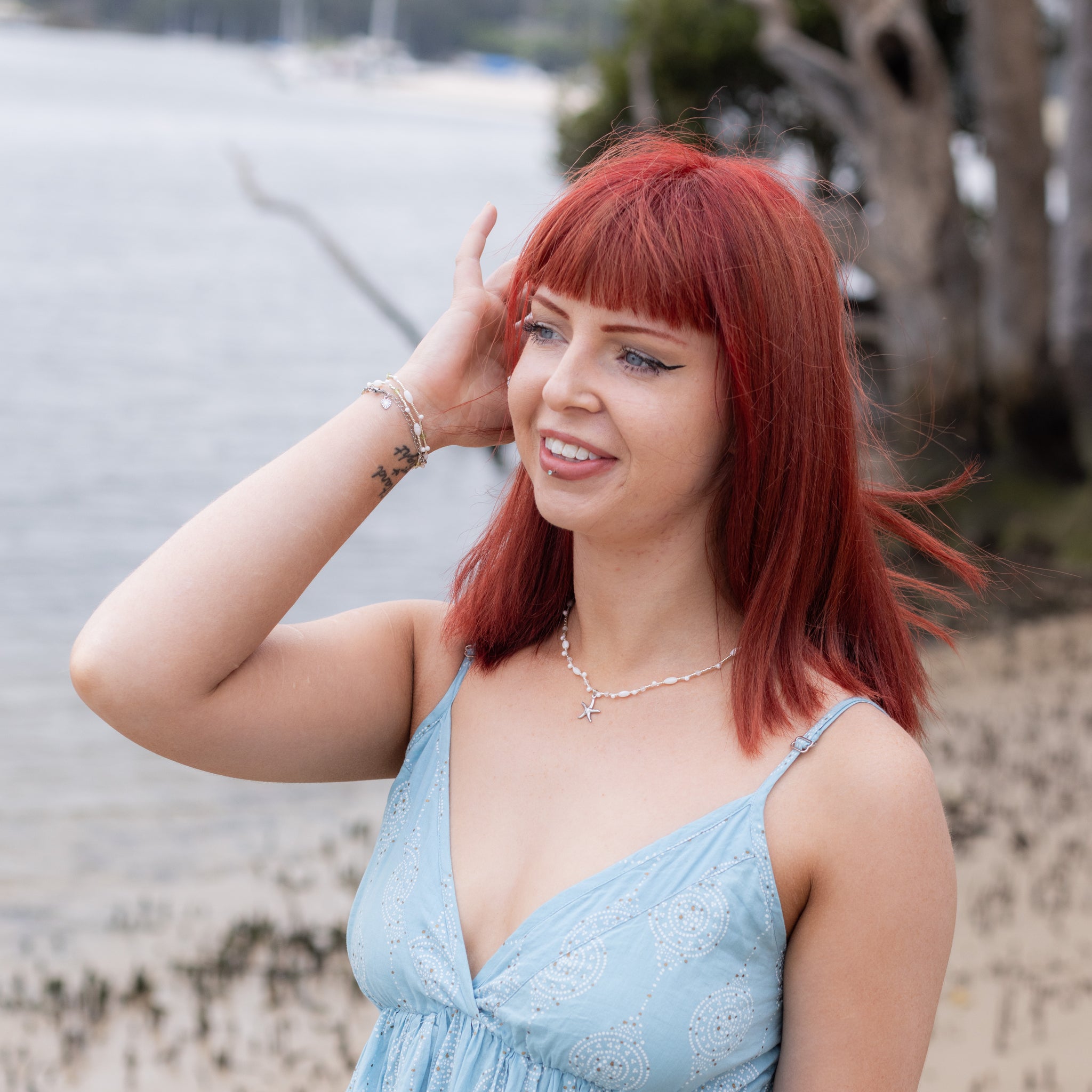 Intuitive Charms Selene's Song Moonstone natural Crystal beaded custom necklace in silver and clasp extension on a model half body view