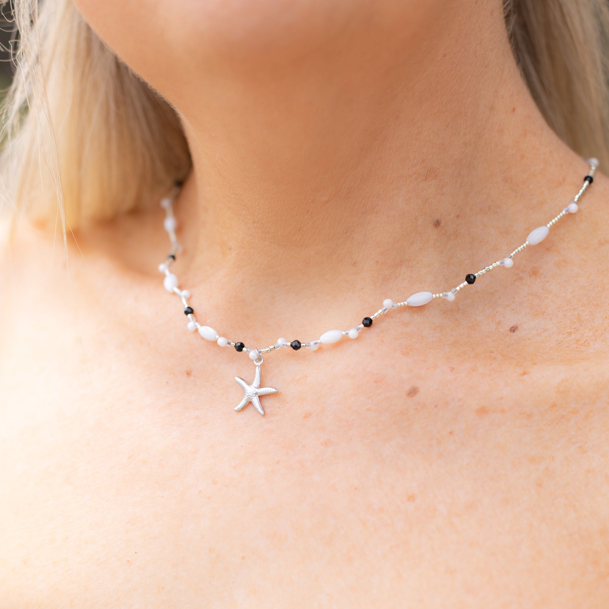 Intuitive Charms Ceto's Song Black tourmaline Braided natural Crystal beaded custom necklace in silver and black cord on neck model