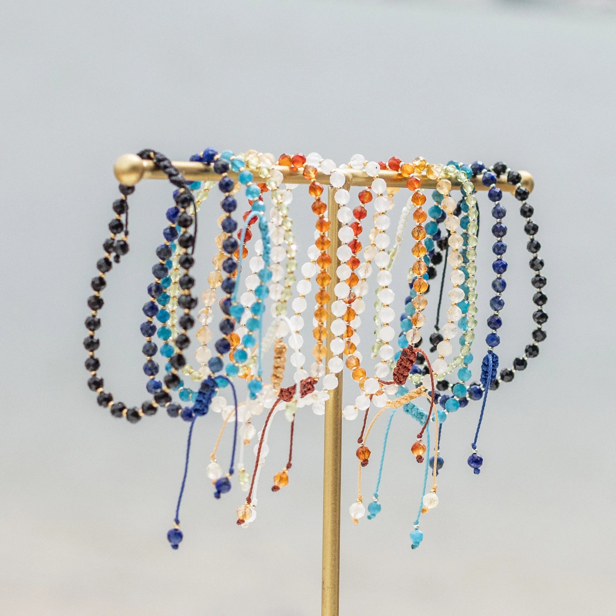 Intuitive Charms natural crystal beaded Jewellery bracelet on a display custom made