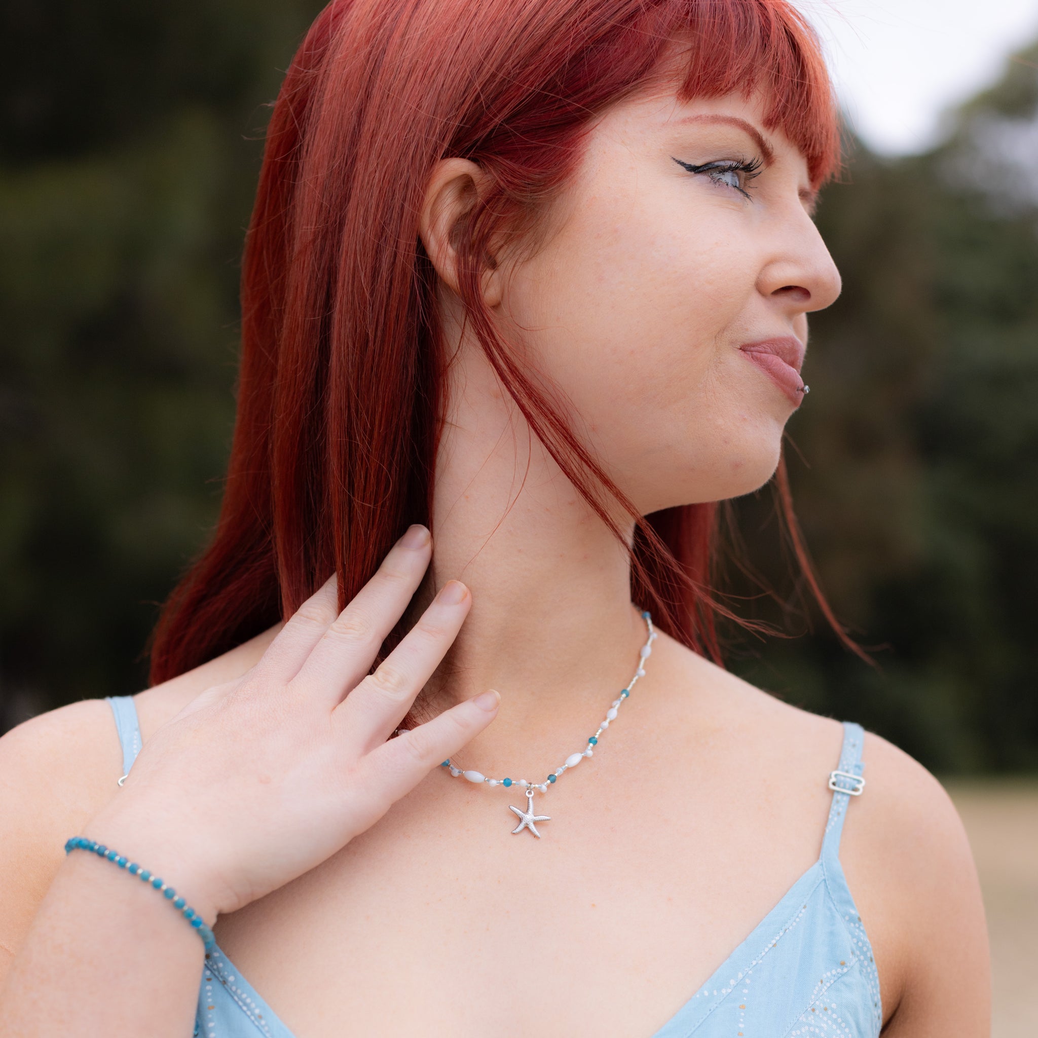 Intuitive Charms Delphina's Song Apatite Braided natural Crystal beaded custom necklace in silver on a model face version